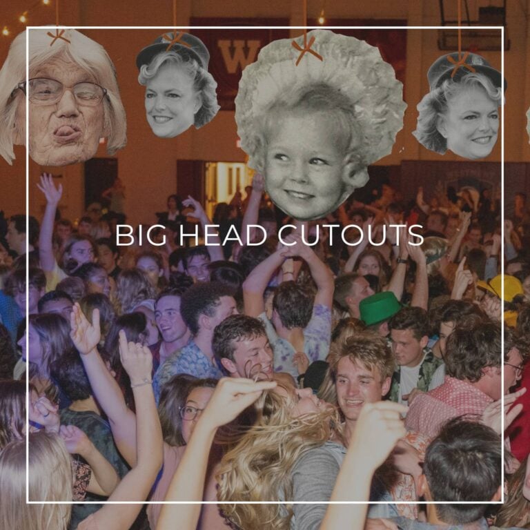 giant custom face cutouts showing the 100th birthday girl at different ages used as hanging decorations above a crowd of dancing party guests