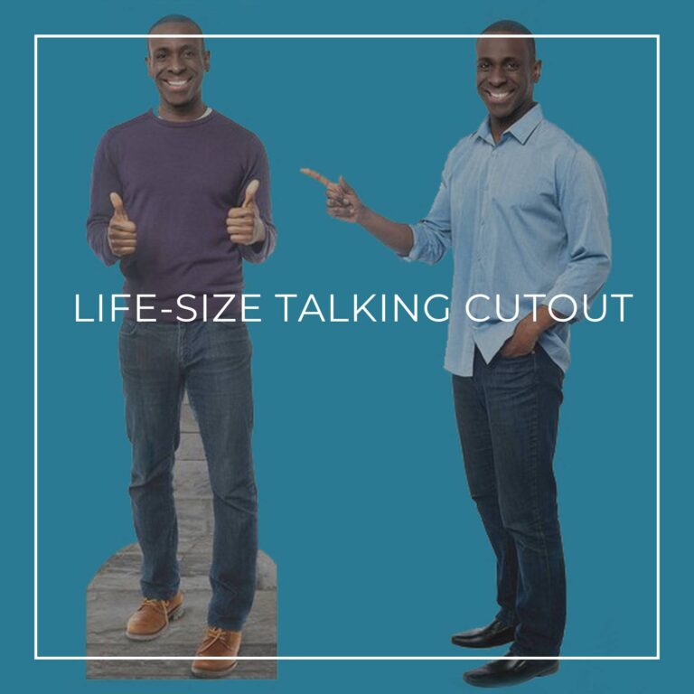 40 year old african american man standing next to a life-size cutout standee of himself