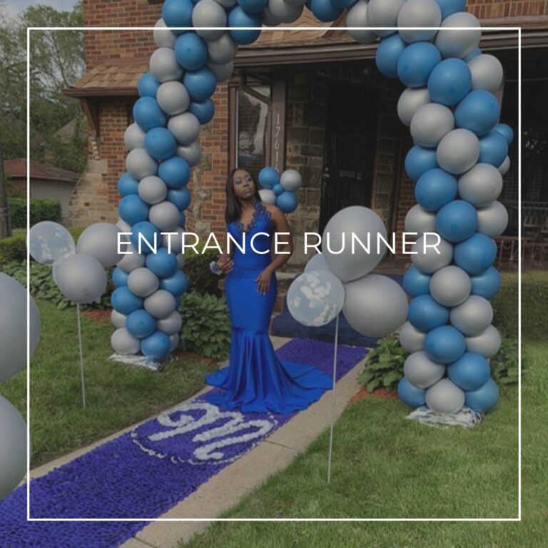blue and white petal entrance runner leading up to party entrance surrounded by balloon garland