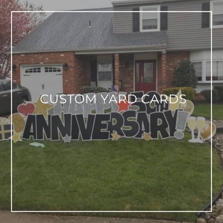 happy anniversary yard card set up on front lawn outside house