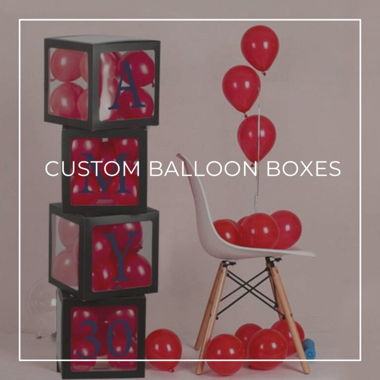 a stack of 4 custom balloon boxes spelling 'Amy is 30' filled with red balloons