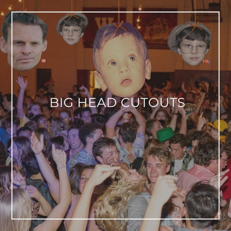 giant custom face cutouts showing the 40th birthday boy at different ages used as hanging decorations above a crowd of dancing party guests