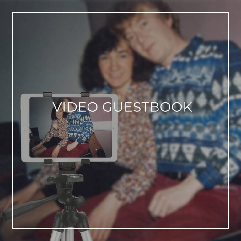 couple recording a video message on a tablet on a tripod for a 50th birthday party