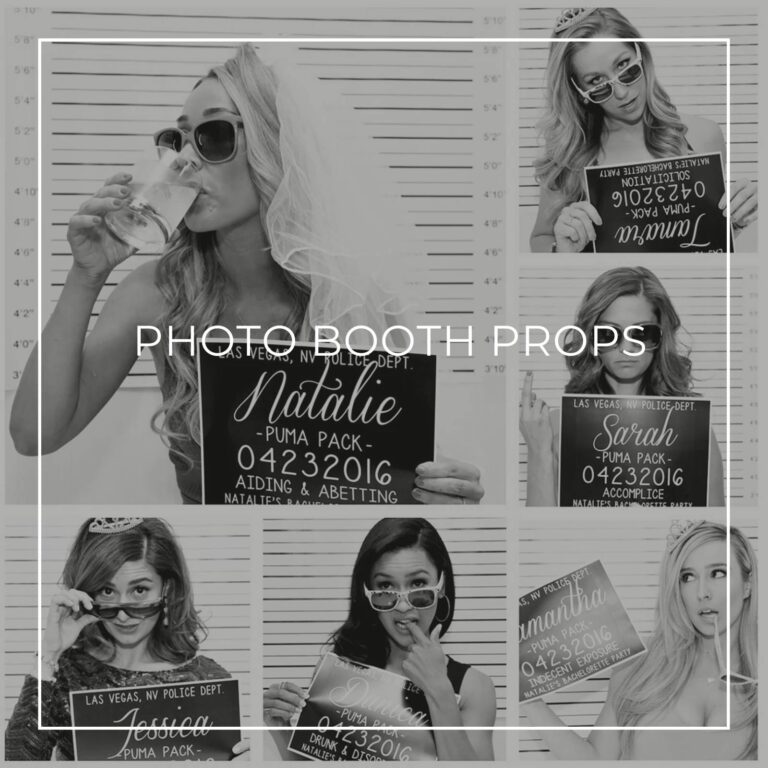 women posing with mug shot police line up photo booth props and signs