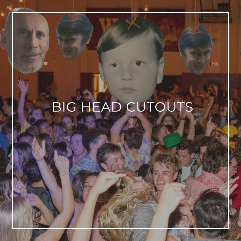 giant custom face cutouts showing the 65th birthday boy at different ages used as hanging decorations above a crowd of dancing party guests