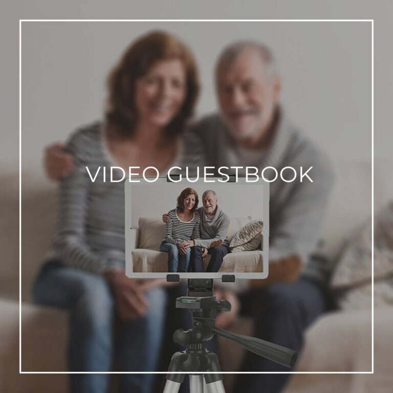 couple recording a video message on a tablet on a tripod for a 65th birthday party