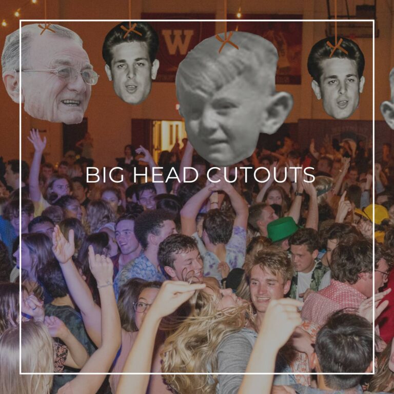 giant custom face cutouts showing the 85th birthday boy at different ages used as hanging decorations above a crowd of dancing party guests