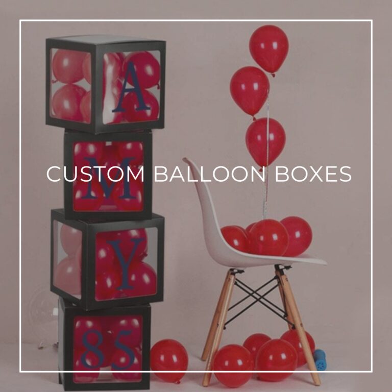 a stack of 4 custom balloon boxes spelling 'Amy is 85' filled with red balloons