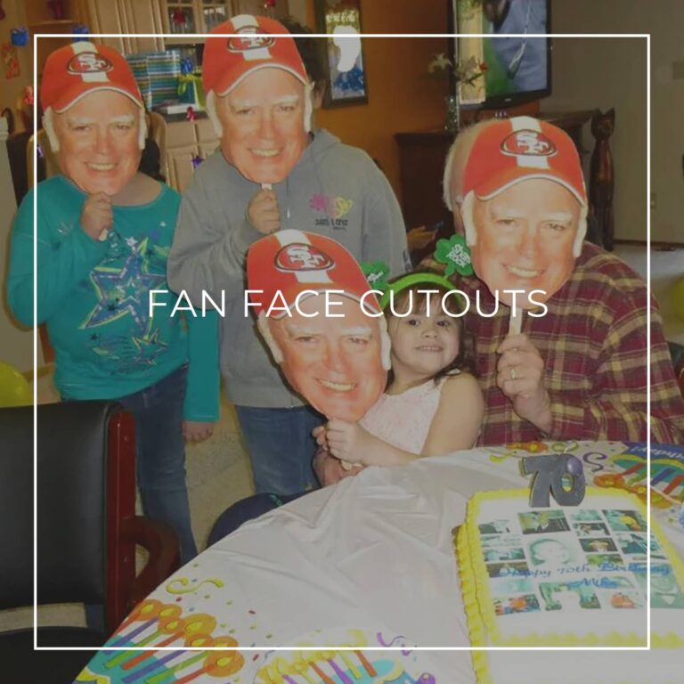 group of people holding custom fan faces of the 85th birthday boy in front of their own faces