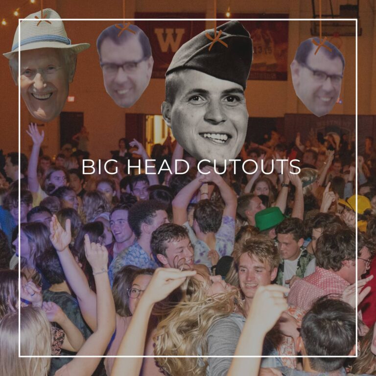 giant custom face cutouts showing the 90th birthday boy at different ages used as hanging decorations above a crowd of dancing party guests