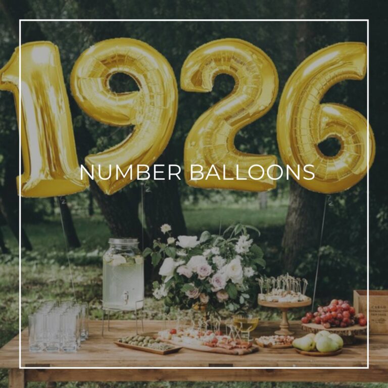 giant number balloons spelling 1926 above a dessert table for an 95th birthday party