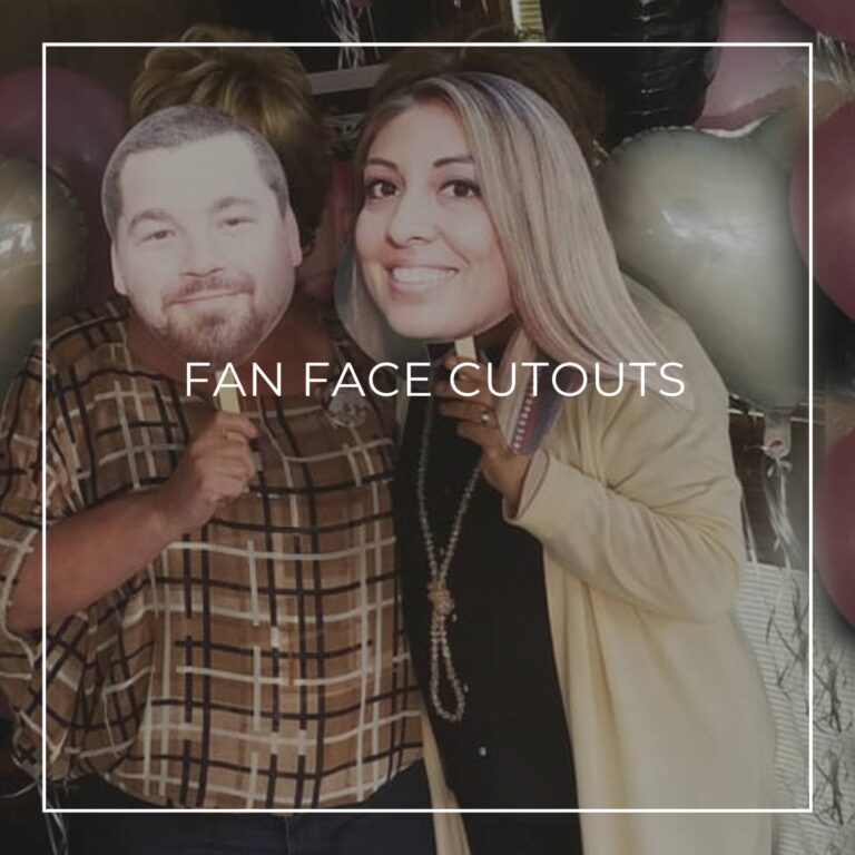 two people holding custom fan faces of the couple in front of their own faces at an anniversary party