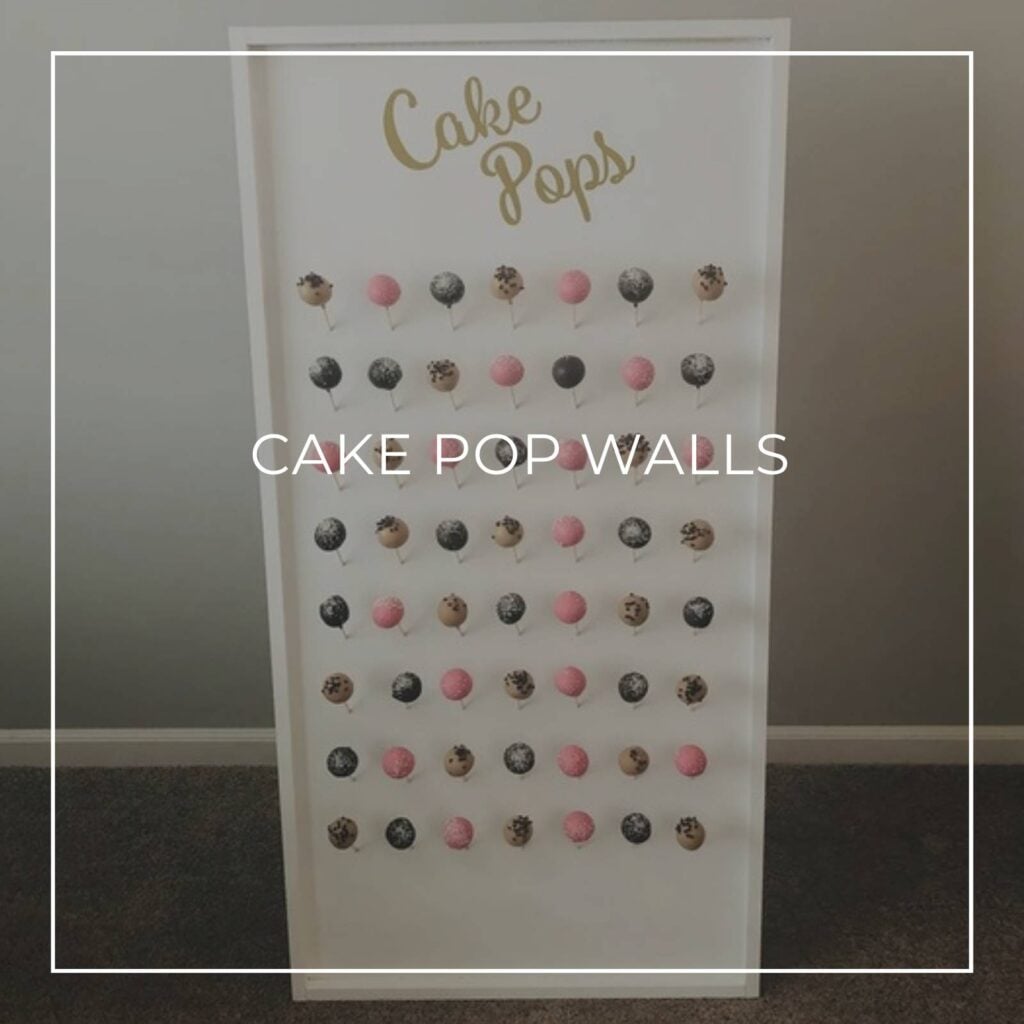 cake pops arranged in rows on a cake pop wall display stand