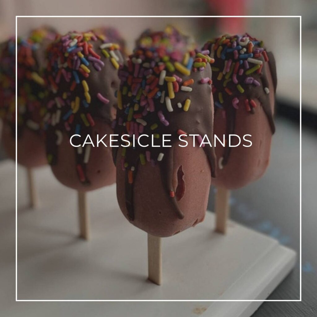cakesicles standing vertically on a cakesicle display stand