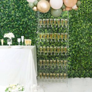champagne glasses filled with champagne displayed on an acrylic champagne wall display stand