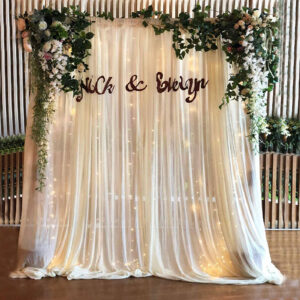ivory chiffon tulle fabric party backdrop for a wedding party