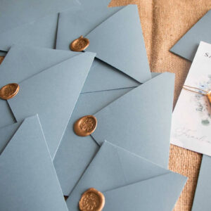 duck egg blue envelopes with gold wax seal