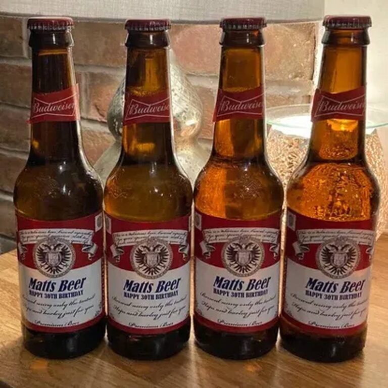 Four Budweiser-style bottles with red-and-white custom labels reading "Matt's Beer, Happy 30th Birthday"