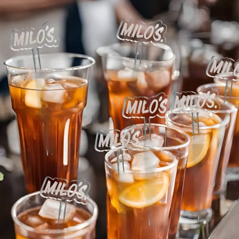 Iced tea glasses with clear acrylic drink stirrers branded “Milo’s”