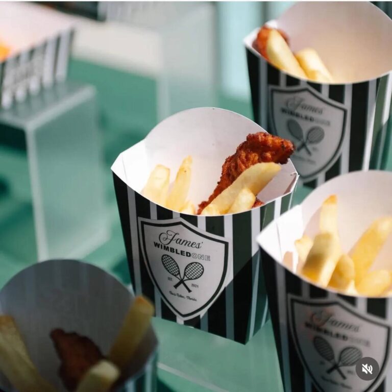 “James’ Wimbledone” fry boxes filled with fries and a fried chicken tender