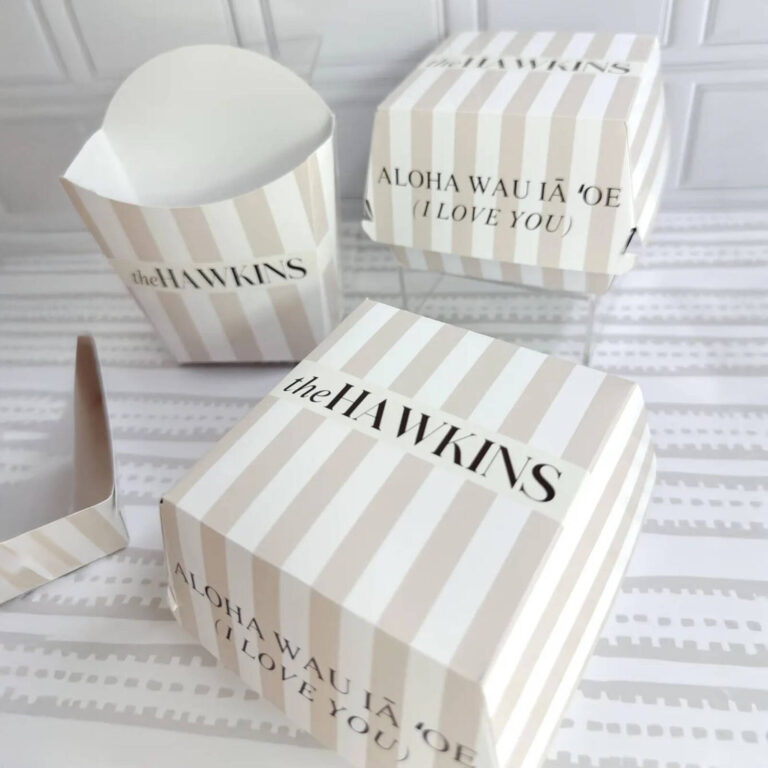 “the Hawkins” fry and burger boxes with “Aloha Wau Iā ’Oe (I Love You)” text