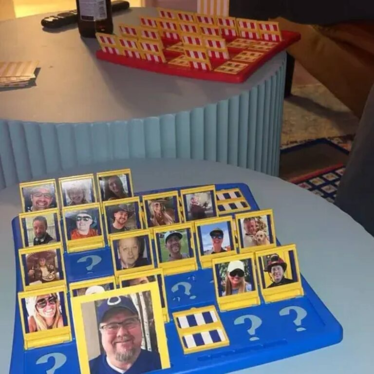 Custom Guess Who card trays displayed on a table during a family gathering