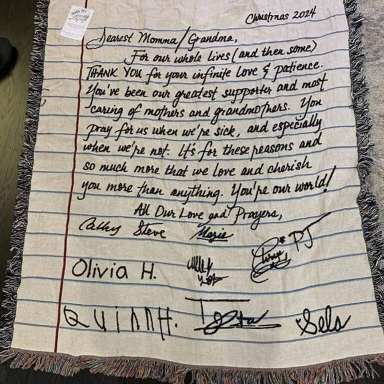 Christmas 2024 blanket letter to ‘Dearest Momma/Grandma’ signed by the whole family, flat lay close-up