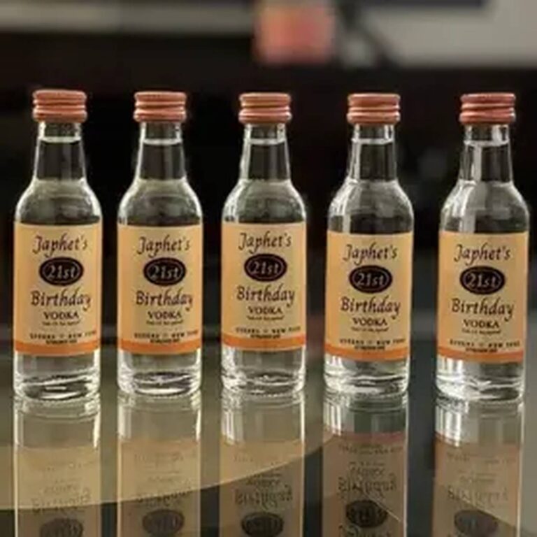 Five mini vodka bottles in a row with matching "Japhet’s 21st Birthday Vodka" labels