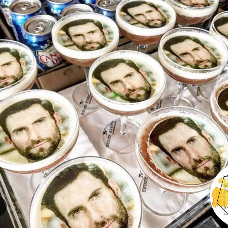 custom photo edible wafer party drinks topper with a photo of the birthday boy floating on cocktails