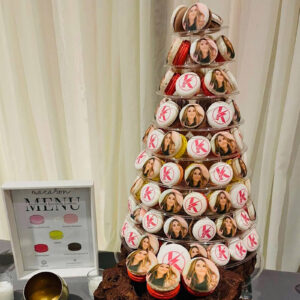 a tower of custom photo personalized macarons printed with a woman's face