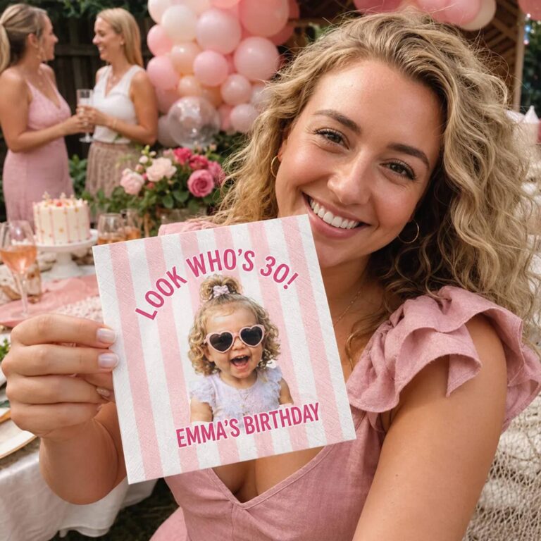 Pink striped “Look Who’s 30! Emma’s Birthday” napkin with a photo of a toddler in heart sunglasses