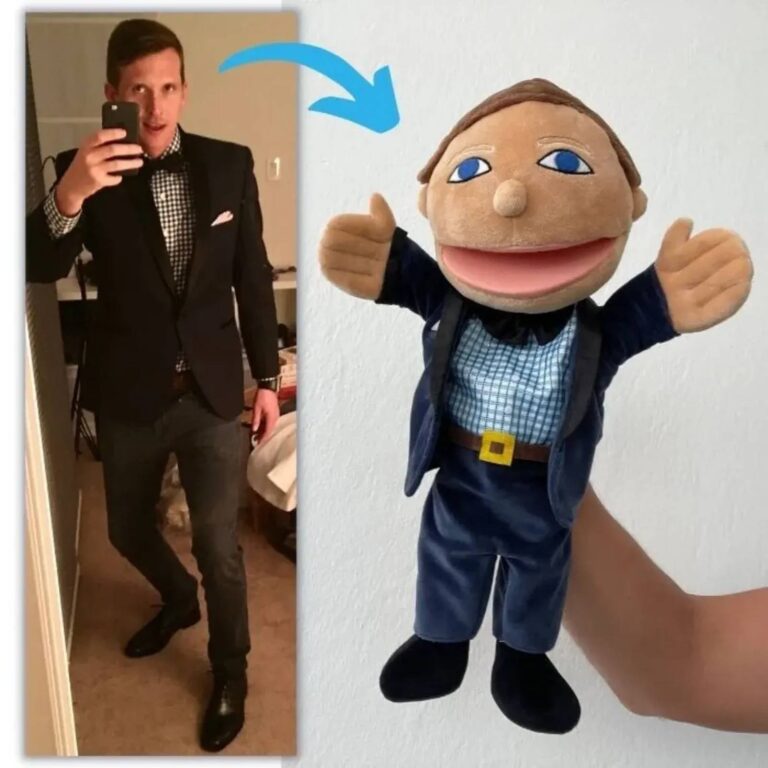 Custom puppet-style plush doll in a navy suit and bow tie giving a thumbs up