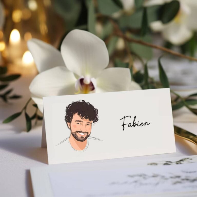 Folded place card with an illustrated portrait of Fabien in front of white orchids