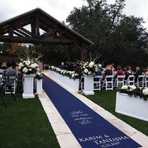 custom name printed blue aisle runner with at an outdoor wedding ceremony