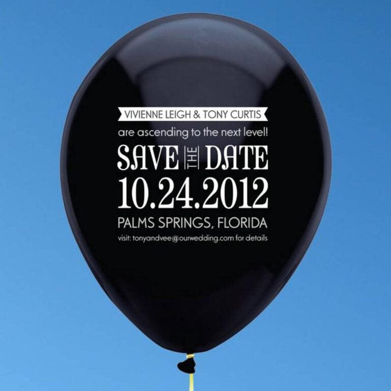 Custom printed black balloon save-the-date for a wedding, styled with vintage film-star names