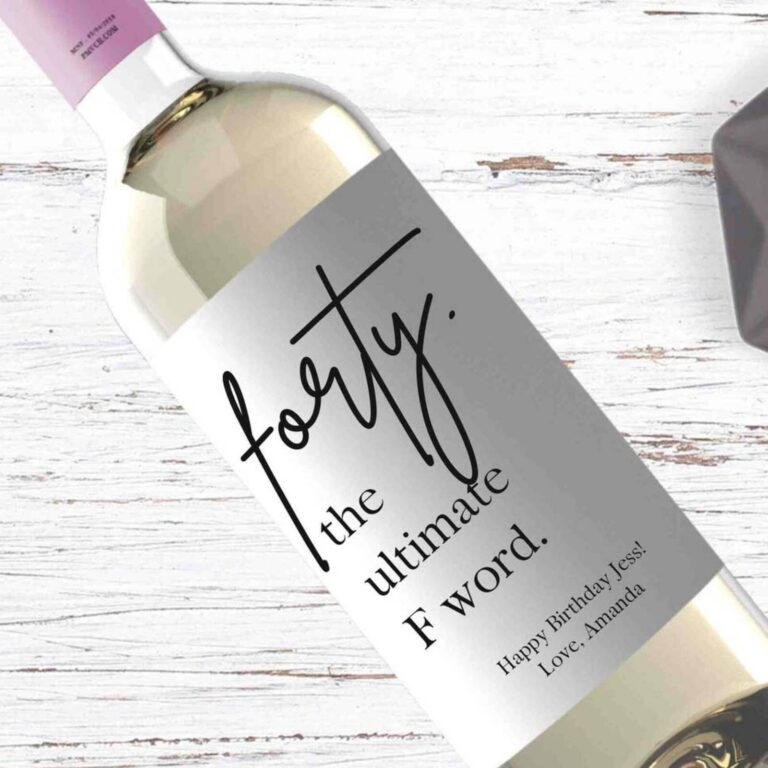 Gold wine bottle with a “Forty, the ultimate F word” label reading “Happy Birthday Jess!”