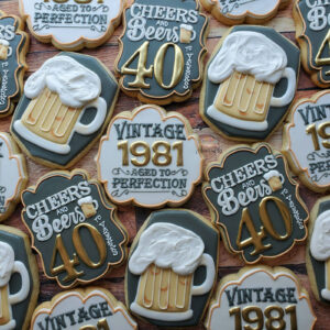 Cheers & Beers to 40 years theme decorated cookies for a 40th birthday party