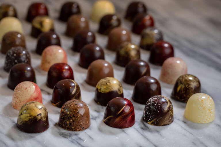 artisan chocolate truffles arranged in rows