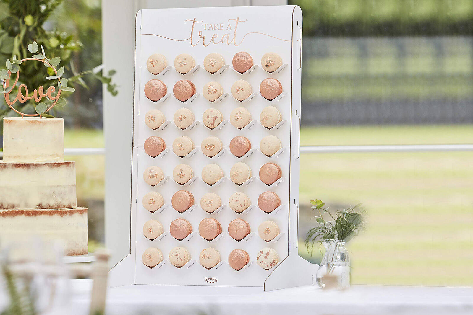 tall macaron stand to add height to your dessert table layout