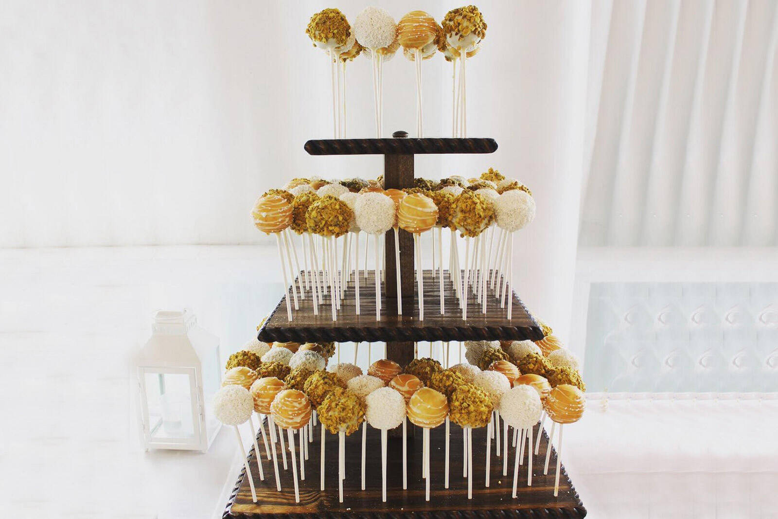 tall cake pop stand to add height to your dessert table layout