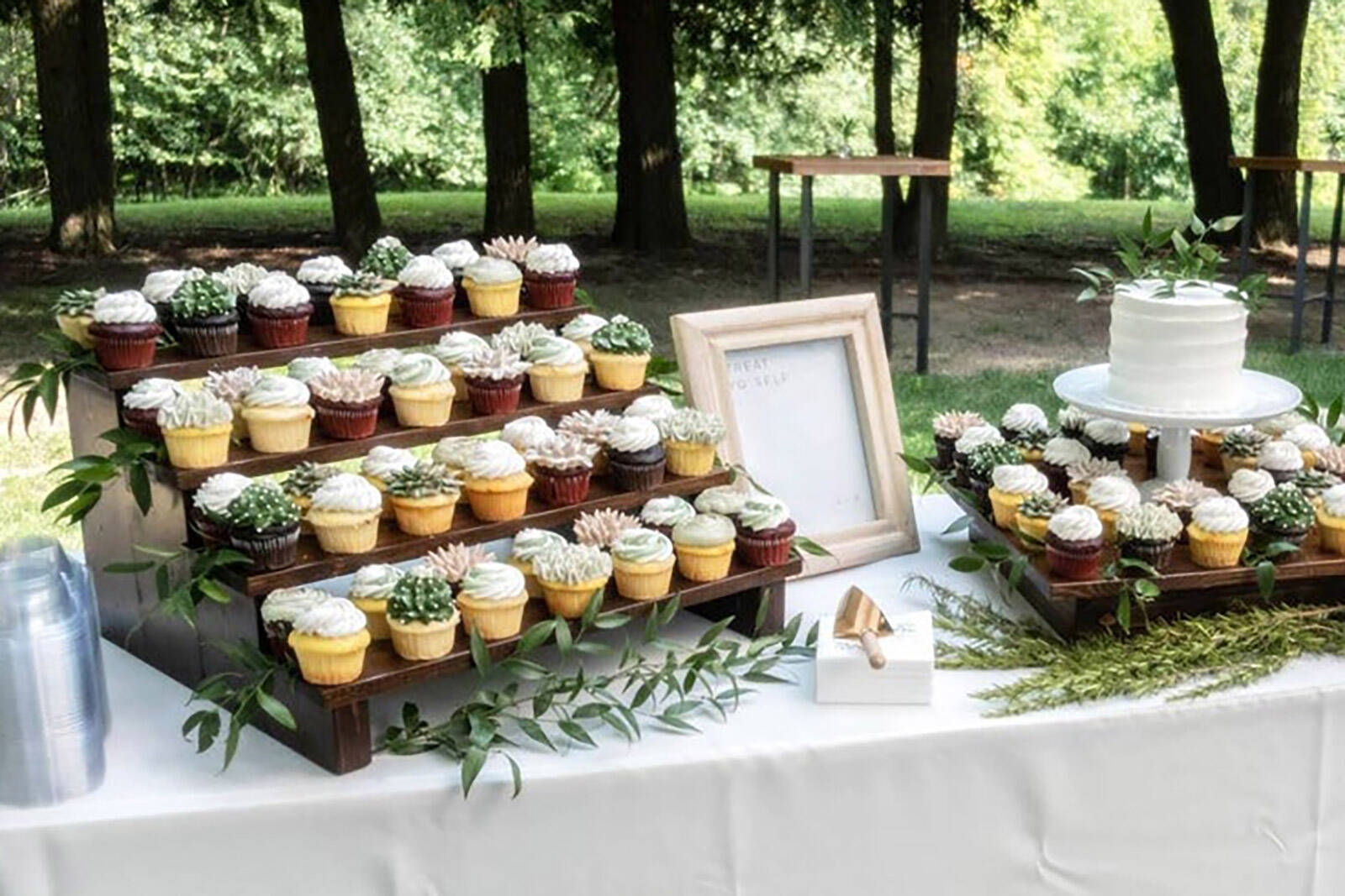 wood tiered cupcake stands to add height to your dessert table layout