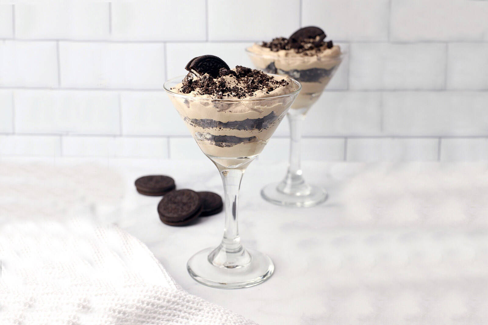 serve desserts in martini glasses to add height to your dessert table layout