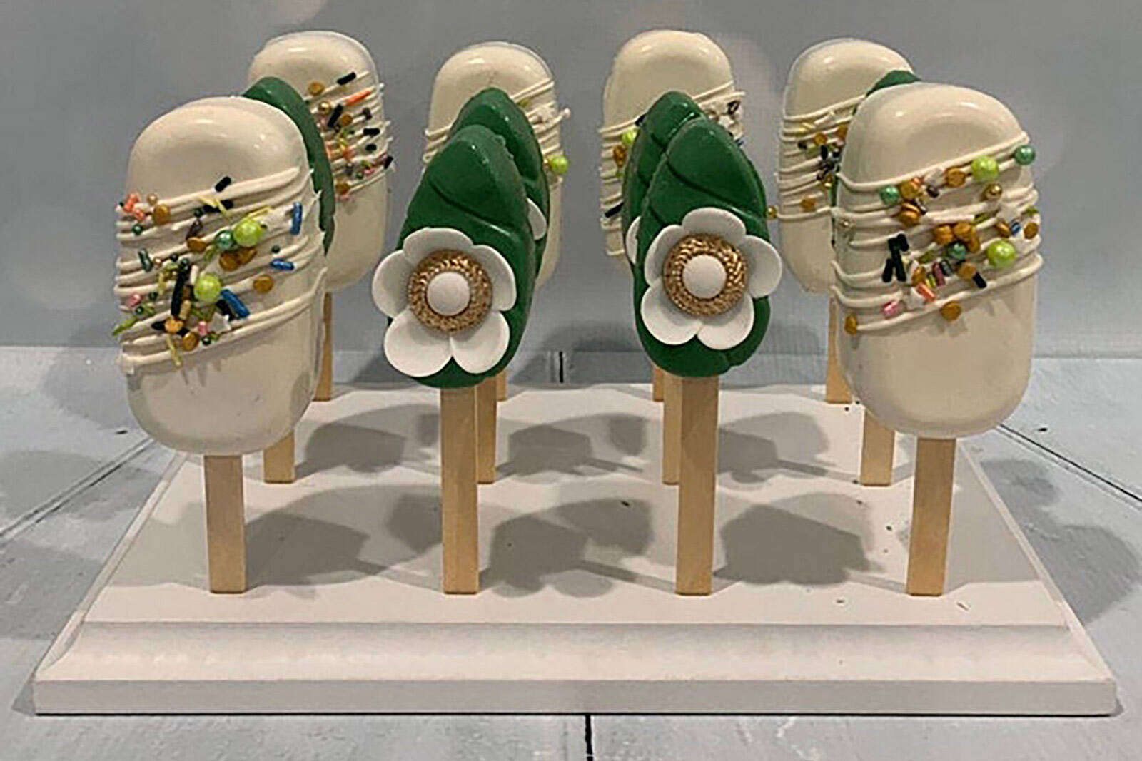 cakesicle stands to present cakesicles vertically