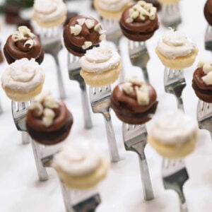 mini cupcakes bites served on individual tasting forks standing upright