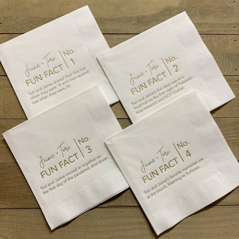 White “Jaime + Tori Fun Fact” napkins No. 1-4, each printed with a different fact about the couple