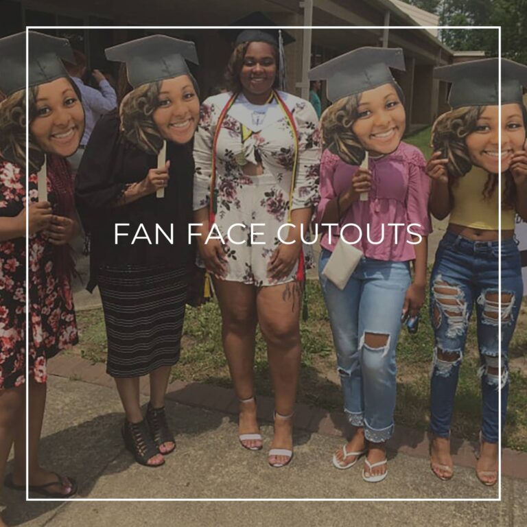 group of people holding custom fan faces of the graduate in front of their own faces at a graduation
