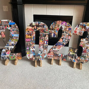 large flat cardboard 2023 numbers covered in a photo collage for a graduation party