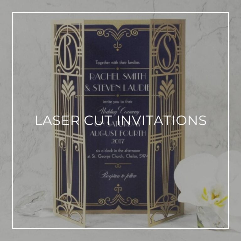 Wedding invitation with gold laser-cut Art Deco panels framing a navy insert card