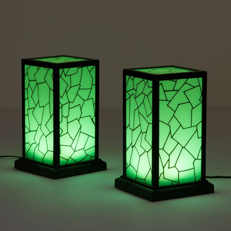 Pair of matching friendship lamps glowing green side by side