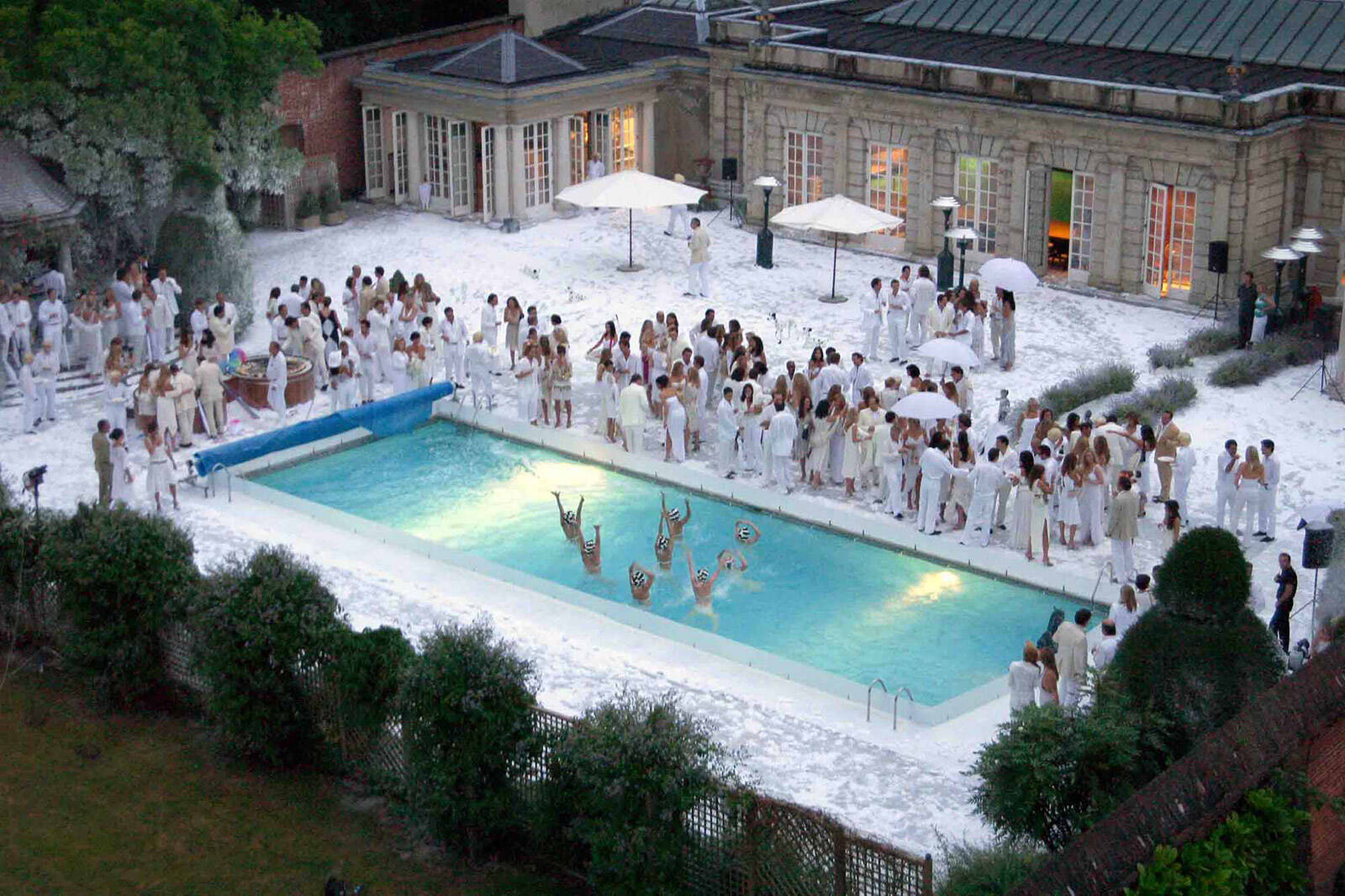 Snow covered White Party at the pool at Cliveden produced by Matt James of Leftfield Productions